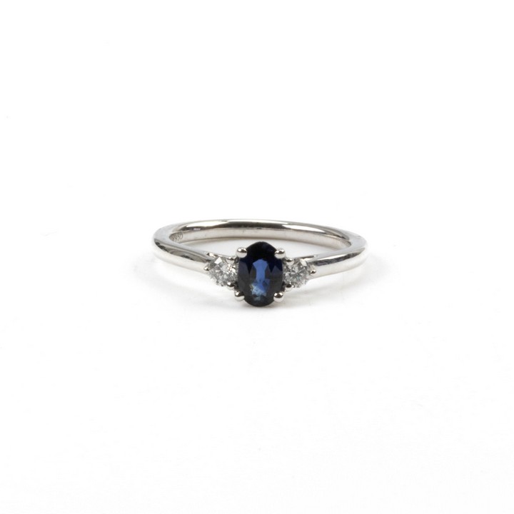 0.54ct Sapphire and 0.15ct Diamond Three Stone Ring, Size L½, 4.1g.  Auction Guide: £650-£850