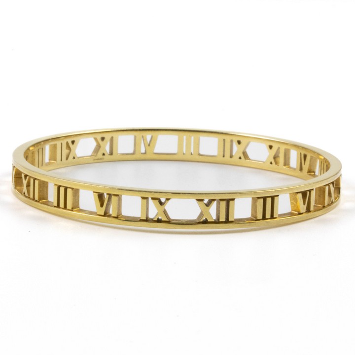 Tiffany & Co 18K Yellow Atlas Bangle, 18cm, 26.3g.  Auction Guide: £1,300-£1,800 (VAT Only Payable on Buyers Premium)