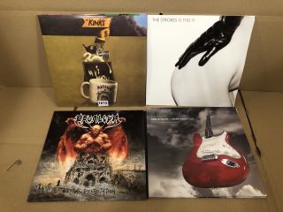 4 X ASSORTED VINYL RECORDS INC THE STOKES IS THIS IT