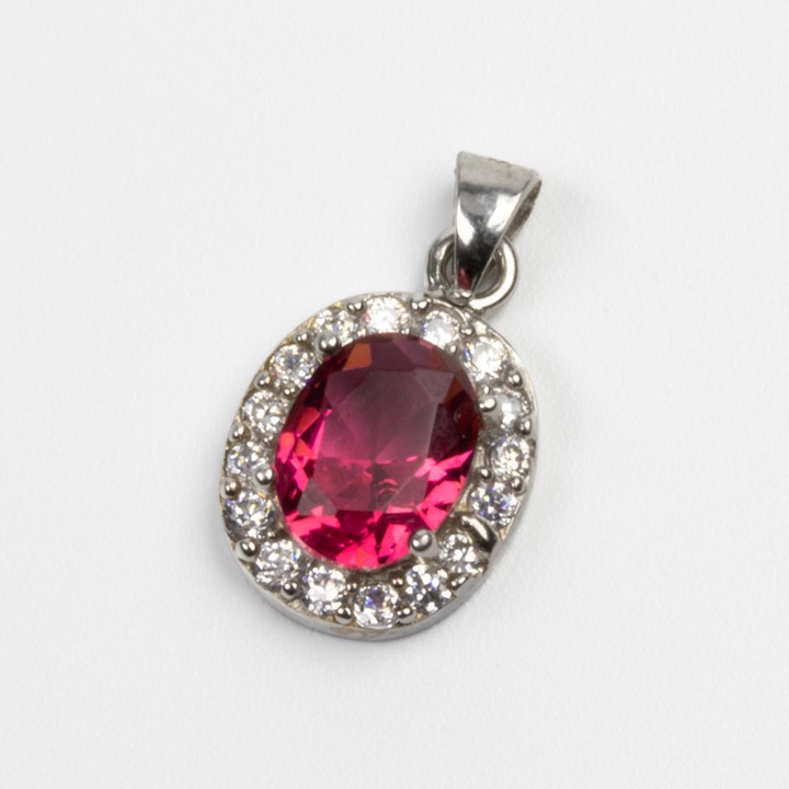 Silver Red Oval-cut Stone with Clear Stone Halo Pendant, 2cm, 1.6g (VAT Only Payable on Buyers Premium)