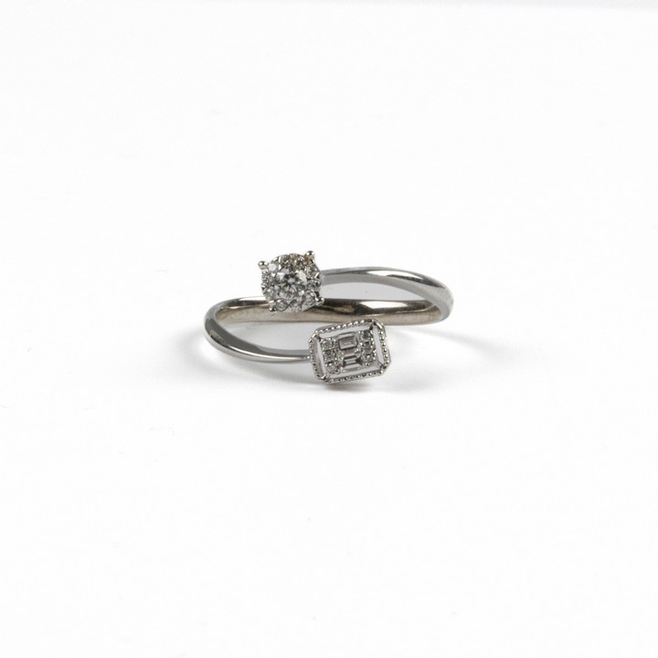 14K White 0.23ct Diamond Split Ring, Size O, 2.3g.  Auction Guide: £350-£450