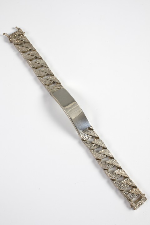 Silver Textured Square Curb ID Bracelet, 19.5cm, 75.4g. (VAT Only Payable on Buyers Premium)