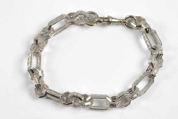 Silver Patterned Hexagonal Link Bracelet, 21cm, 29.8g. (VAT Only Payable on Buyers Premium)