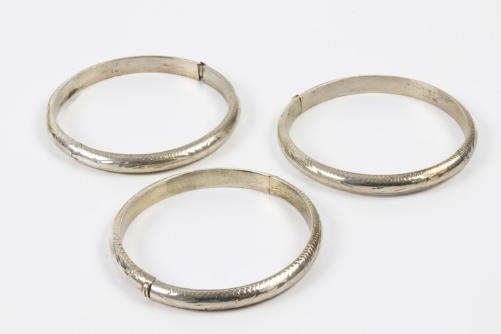 Silver Trio of Three Patterned Baby Bangles, 14cm, total weight 22.6g. (VAT Only Payable on Buyers Premium)