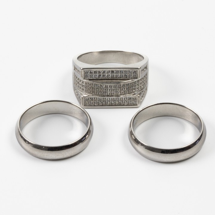 Silver Clear Stone Pavé Ring and Two Plain Band Rings, Size R½, total weight 15.7g. (VAT Only Payable on Buyers Premium)