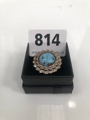 A VINTAGE WHITE METAL RING WITH A TURQUOISE STONE, BOXED (DELIVERY ONLY)