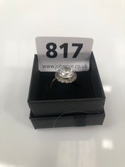 A WHITE METAL RING SET WITH CLEAR STONES, BOXED (DELIVERY ONLY)