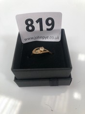 A YELLOW METAL RING SET WITH A CLEAR STONE, BOXED (DELIVERY ONLY)