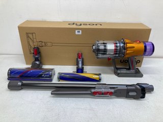 DYSON V12 ABSOLUTE CORDLESS VACUUM CLEANER IN NICKEL/YELLOW - MODEL SV46 - RRP £529: LOCATION - BOOTH