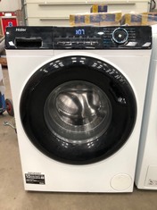 HAIER DIRECT MOTION WASHING MACHINE MODEL  HW100-B14939: LOCATION - FLOOR(COLLECTION OR OPTIONAL DELIVERY AVAILABLE)