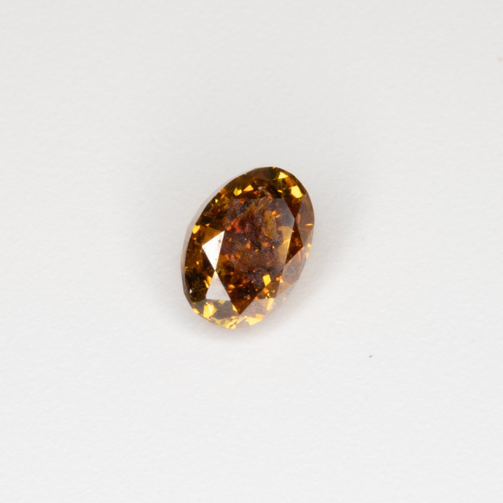 0.58ct Natural Fancy Orange-Brown Diamond Oval-cut Single Gemstone, Clarity Si2.  Auction Guide: £900-£1,100 (VAT Only Payable on Buyers Premium)