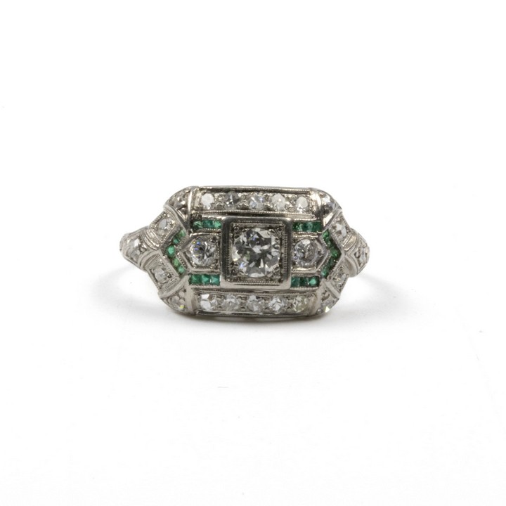 18K White 1.05ct Diamond and Emeralds Fancy Ring, Size P½, 4.4g. Colour G-H, Clarity Si.  Auction Guide: £1,800-£2,300 (VAT Only Payable on Buyers Premium)