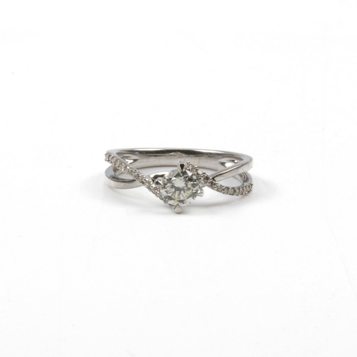 18K White 0.55ct Diamond Single Stone and Shoulders Twist Double Band Ring, Size L, 2.9g.  Auction Guide: £1,400-£1,900