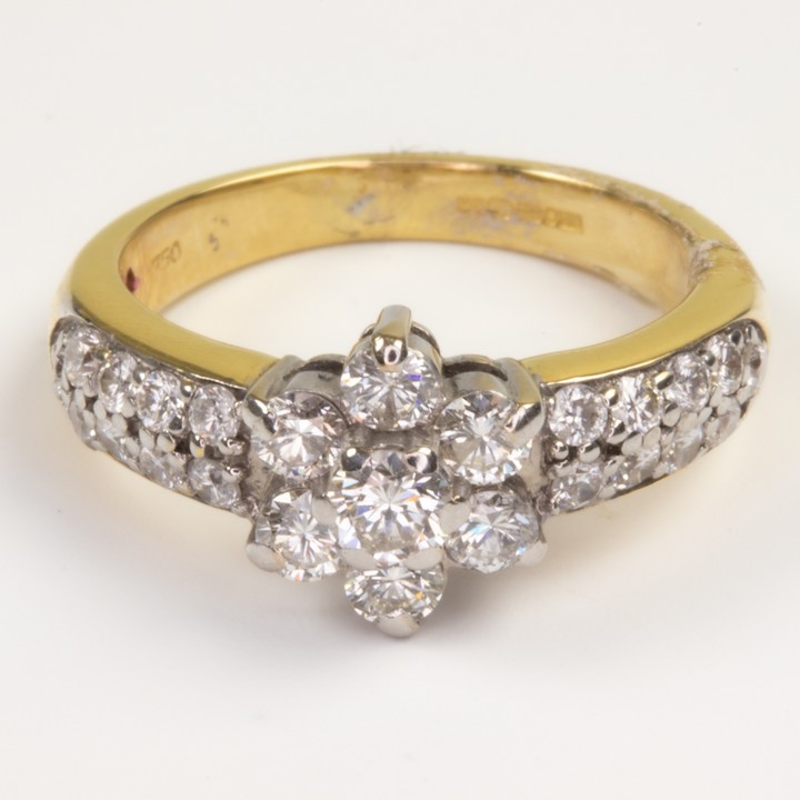 18ct Yellow and White Gold 1.30ct Diamond Flower and Double Row Shoulders Ring, Size J½, 5.1g. Colour F-G, Clarity VVS-VS.  Auction Guide: £1,200-£1,700 (VAT Only Payable on Buyers Premium)