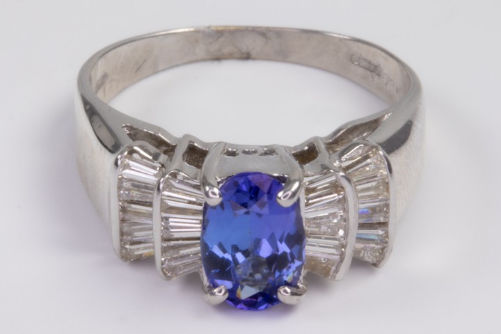 18ct White Gold 1.20ct Blue Tanzanite and 0.60ct Diamond Shoulders Ring, Size N, 4.7g. Colour G, Clarity VS.  Auction Guide: £900-£1,100 (VAT Only Payable on Buyers Premium)