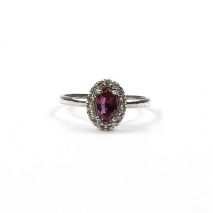 14K White 0.50ct Ruby and 0.14ct Diamond Ring, Size K½, 1.8g.  Auction Guide: £650-£850