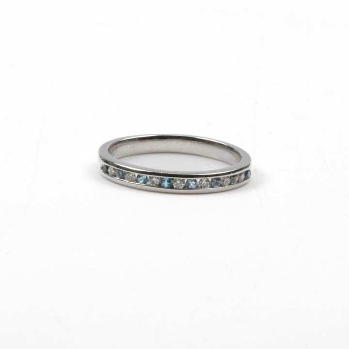 18ct White Gold 0.15ct Blue Topaz and 0.11ct Diamond Half Eternity Ring, Size M, 2.6g.  Auction Guide: £350-£450