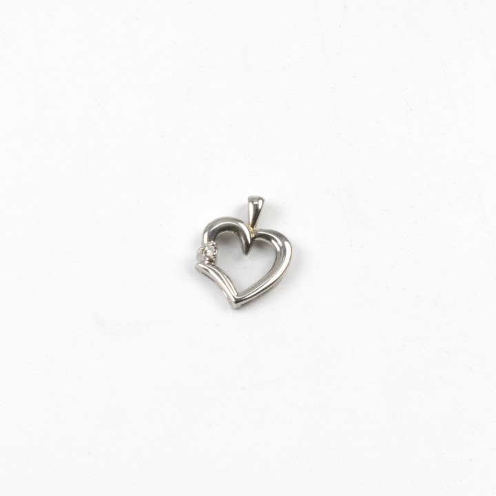 9K White 0.05ct Diamond Heart Pendant, 2x1.5cm, 1.6g.  Auction Guide: £150-£200
