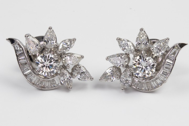 18K White 1.00ct Diamond Centre Stone and 2.78t Diamond Surround Pair of Floral Stud Earrings, 6.6g. Colour F-H, Clarity VS1-VS2. Report WGI9624140230.  Auction Guide: £6,500-£7,500 (VAT Only Payable