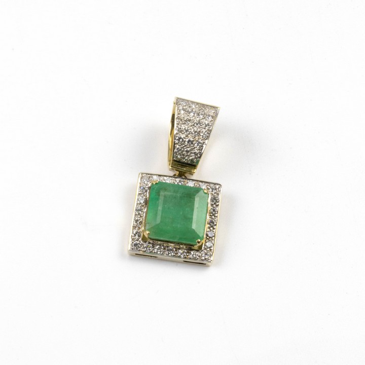 18K Yellow and White 8.63ct Natural Green Columbian Emerald with 1.46ct Diamonds Pendant, 4x2cm, 17.2g. Colour G-H, Clarity VS2-Si1. Report WGI9624141023.  Auction Guide: £6,000-£7,000 (VAT Only Paya
