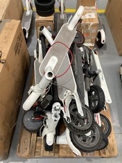 PALLET OF BROKEN ELECTRIC SCOOTERS FOR PARTS OR REPAIR.
