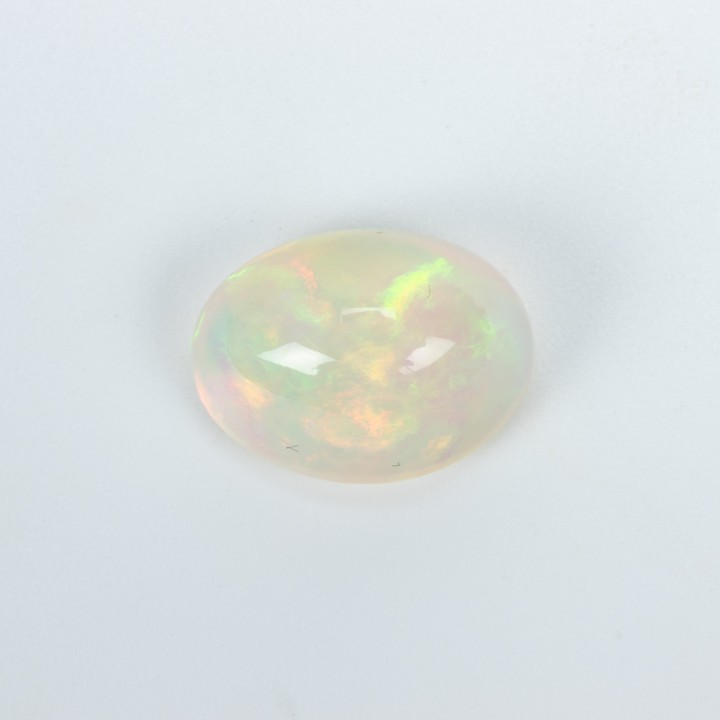 4.44ct Natural Rainbow White Ethiopian Opal Cabochon Oval-cut Single Gemstone, 14x10.5mm.  Auction Guide: £200-£300