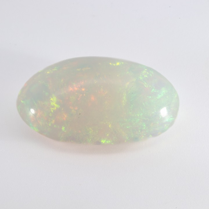 5.20ct Natural Rainbow White Ethiopian Opal Cabochon Oval-cut Single Gemstone, 16.5x10.5mm.  Auction Guide: £200-£300