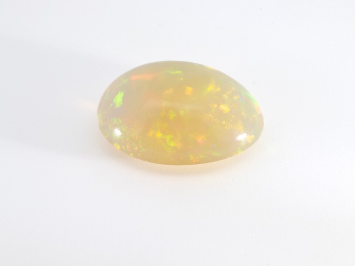 3.85ct Natural Rainbow White Ethiopian Opal Cabochon Oval-cut Single Gemstone, 13.91x10.43mm.  Auction Guide: £150-£200