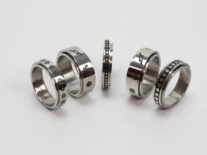 Selection of Five Metal Patterned Band Rings, Size P½, total weight 25.9g (VAT Only Payable on Buyers Premium)