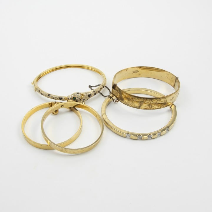 Gold Plated Metal Selection of Five Bangles, 14.5-18.5cm, 94.5g (VAT Only Payable on Buyers Premium)