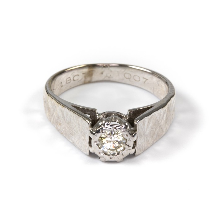 18K White 0.25ct Diamond Solitaire Patterned Shoulders Ring, Size M, 5.2g. Colour G-H, Clarity Si1.  Auction Guide: £500-£700 (VAT Only Payable on Buyers Premium)
