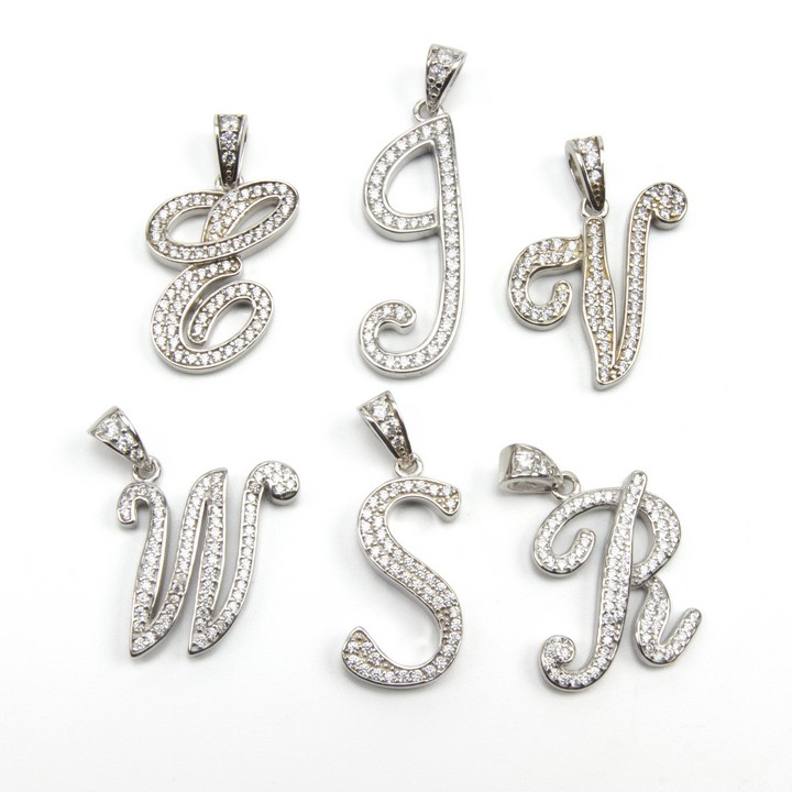 Silver Selection of Six Initial S, J, E, V, M and R Pendants, 18.9g (VAT Only Payable on Buyers Premium)