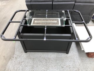 OUTDOOR DINING TABLE WITH CENTRE PARAFFIN HEATER: LOCATION - D1