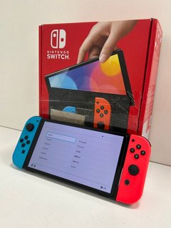 NINTENDO SWITCH OLED MODEL 64GB GAMES CONSOLE IN NEON BLUE / NEON RED: MODEL NO HEG-001 (WITH BOX & ALL ACCESSORIES) [JPTM113747] THIS PRODUCT IS FULLY FUNCTIONAL AND IS PART OF OUR PREMIUM TECH AND