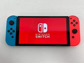 NINTENDO SWITCH OLED EDITION 64GB GAMES CONSOLE (ORIGINAL RRP - £309) IN NEON BLUE & NEON RED: MODEL NO HEG-001 (WITH BOX & ALL ACCESSORIES) [JPTM113693] THIS PRODUCT IS FULLY FUNCTIONAL AND IS PART