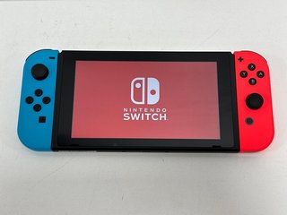 NINTENDO SWITCH 32GB GAMES CONSOLE IN NEON BLUE & NEON RED: MODEL NO HAC-001(-01, WITH BOX & ALL ACCESSORIES) [JPTM113744] THIS PRODUCT IS FULLY FUNCTIONAL AND IS PART OF OUR PREMIUM TECH AND ELECTRO
