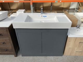 (COLLECTION ONLY) FLOOR STANDING 2 DOOR SINK UNIT IN GLOSS GREY WITH A 1010 X 500MM 1TH CERAMIC BASIN COMPLETE WITH A WATERFALL SPOUT MONO BASIN MIXER TAP & CHROME SPRUNG WASTE - RRP £920: LOCATION -