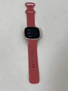 FITBIT VERSA 4 SMARTWATCH (ORIGINAL RRP - £169) IN COPPER ROSE ALUMINIUM CASE & PINK SAND INFINITY BAND: MODEL NO FB523RGRW (WITH BOX, STRAP, MANUAL & CHARGER CABLE) [JPTM114198]