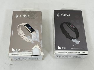 2X FITBIT LUXE HEALTH & FITNESS TRACKERS (ORIGINAL RRP - £198): MODEL NO FB422 (WITH BOXES, MANUAL & CHARGER CABLES, COMBINED RRP £198) [JPTM114032]