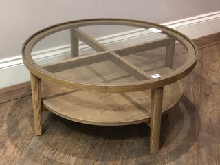 HOLCOT LARGE ROUND COFFEE TABLE IN GREY WASHED ASH FINISH WITH CLEAR GLASS TOP - RRP £529: LOCATION - C2