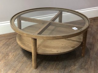 HOLCOT LARGE ROUND COFFEE TABLE IN GREY WASHED ASH FINISH WITH CLEAR GLASS TOP - RRP £529: LOCATION - C3