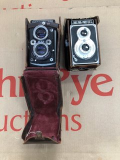 2 X ASSORTED HALINA PREFECT AND MICROCORD VINTAGE CAMERAS IN LEATHER CASES: LOCATION - F5