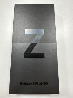 SAMSUNG GALAXY Z FLIP 3 5G 128GB SMARTPHONE IN PHANTOM BLACK: MODEL NO SM-F711B (WITH BOX & CHARGE CABLE, PHONE SHOWS SIGNS OF COSMETIC DAMAGE) [JPTM114464]. THIS PRODUCT IS FULLY FUNCTIONAL AND IS P