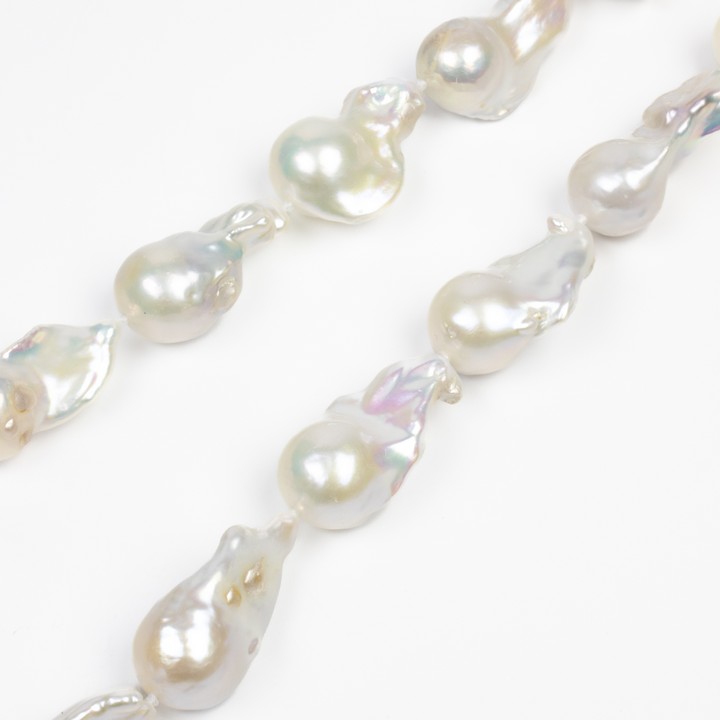 Silver Clasp Natural White Baroque Pearl Necklace, 50cm, 116.6g.  Auction Guide: £200-£300 (VAT Only Payable on Buyers Premium)