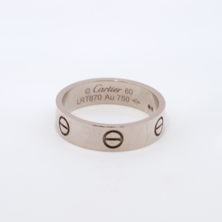 Cartier 18ct White Gold Love Ring, Size S, 7g. In Original Box.  Auction Guide: £300-£500 (VAT Only Payable on Buyers Premium)