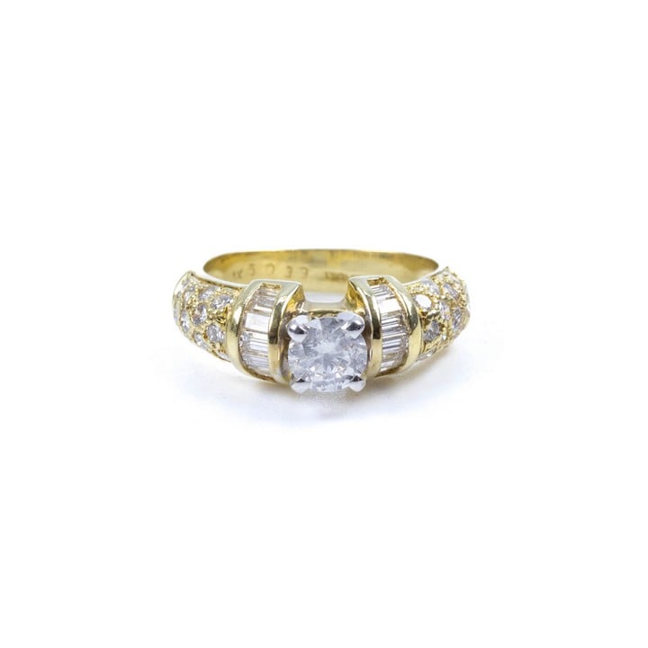 18K Yellow 1.60ct Diamond Single Stone with Baguette and Pavé Shoulders Ring, Size L, 6.9g. Colour H, Clarity I1.  Auction Guide: £800-£1,000 (VAT Only Payable on Buyers Premium)