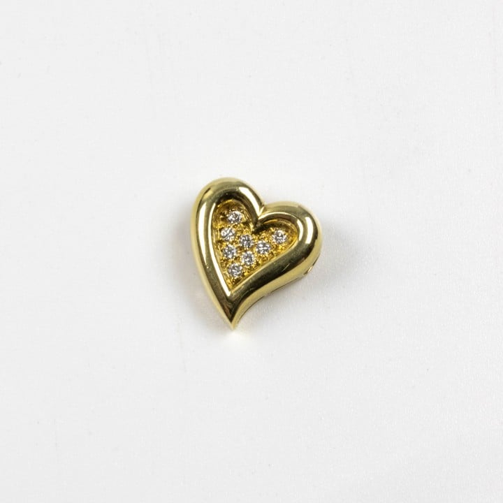 18ct Yellow Gold 0.20ct Diamond Heart Pendant, 1.5x1.5cm, 3.3g.  Auction Guide: £200-£300 (VAT Only Payable on Buyers Premium)