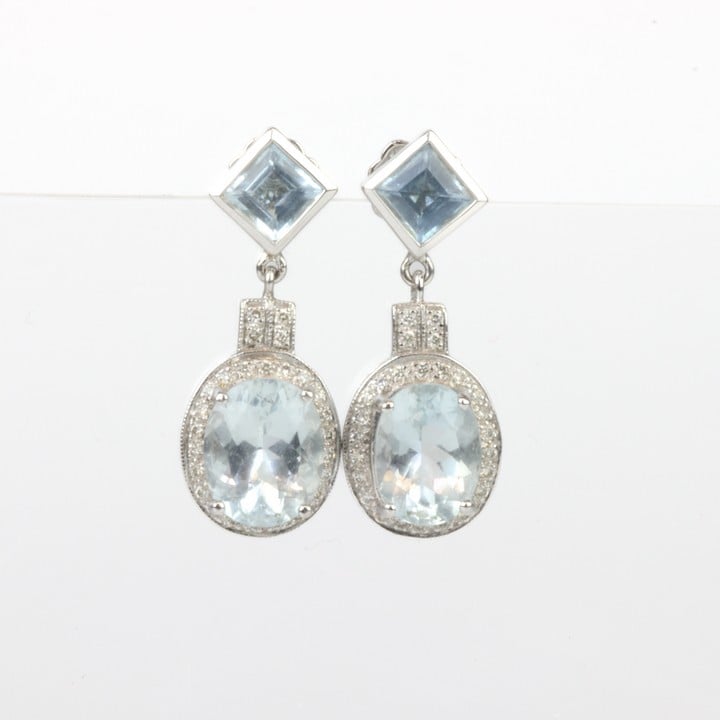18K White Blue Stone and Diamond Halo Drop Earrings, 2.5cm, 8g.  Auction Guide: £300-£400 (VAT Only Payable on Buyers Premium)