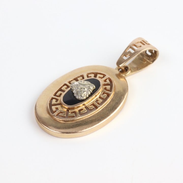14K Rose Oval Pendant, 3.7x1.9cm, 6.3g.  Auction Guide: £200-£300 (VAT Only Payable on Buyers Premium)