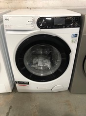 AEG PROSTEAM 9/6KG WASHER DRYER WHITE (CRACKED/SMASHED FRONT DOOR SCREEN) - MODEL NO-LWR7496O4B - RRP- £855 (COLLECTION OR OPTIONAL DELIVERY)